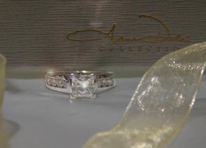 Channel Set Rounds with 1.50 Carat Princes Center