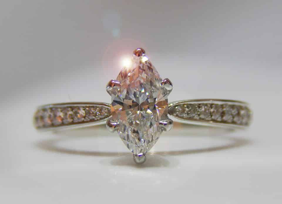 Stunning Marquise in Six Prong with Bead Set Rounds